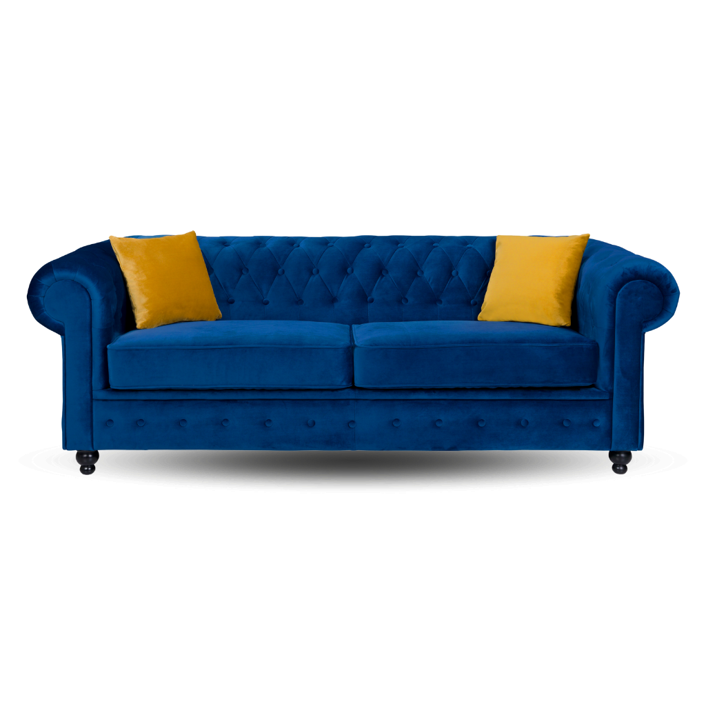 chesterfield 3 seater sofa plush velvet blue with 2 yellow pillow on the side www.furniturestop.co.uk