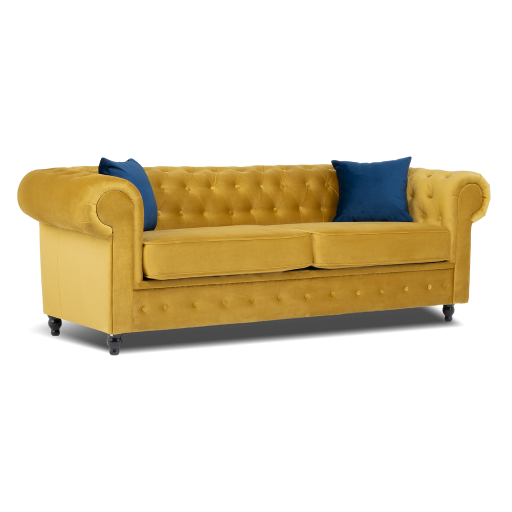 chesterfield 3 seater sofaplush velvet mustard with 2 blue pillow on the side www.furniturestop.co.uk